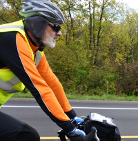 Photo of bicyclist wearing winter clothing.